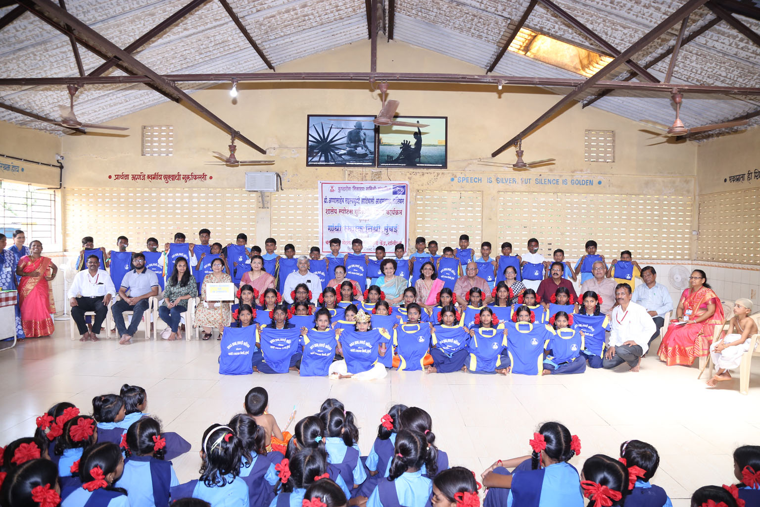 Students proudly display their sports uniforms